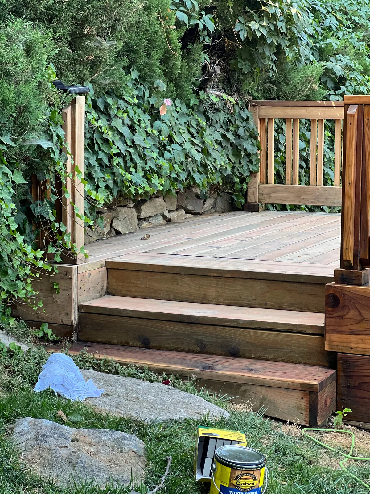 Cedar deck stain steps by Glenn Painting Co