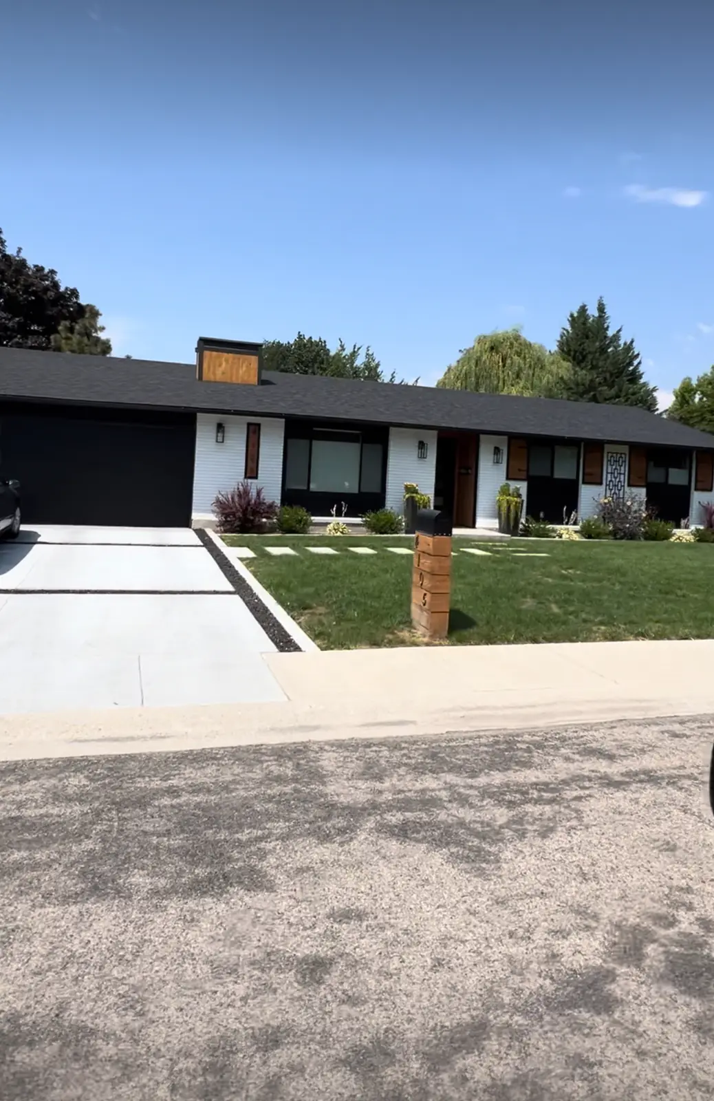 Modern ranch exterior white black by Glenn Painting Co