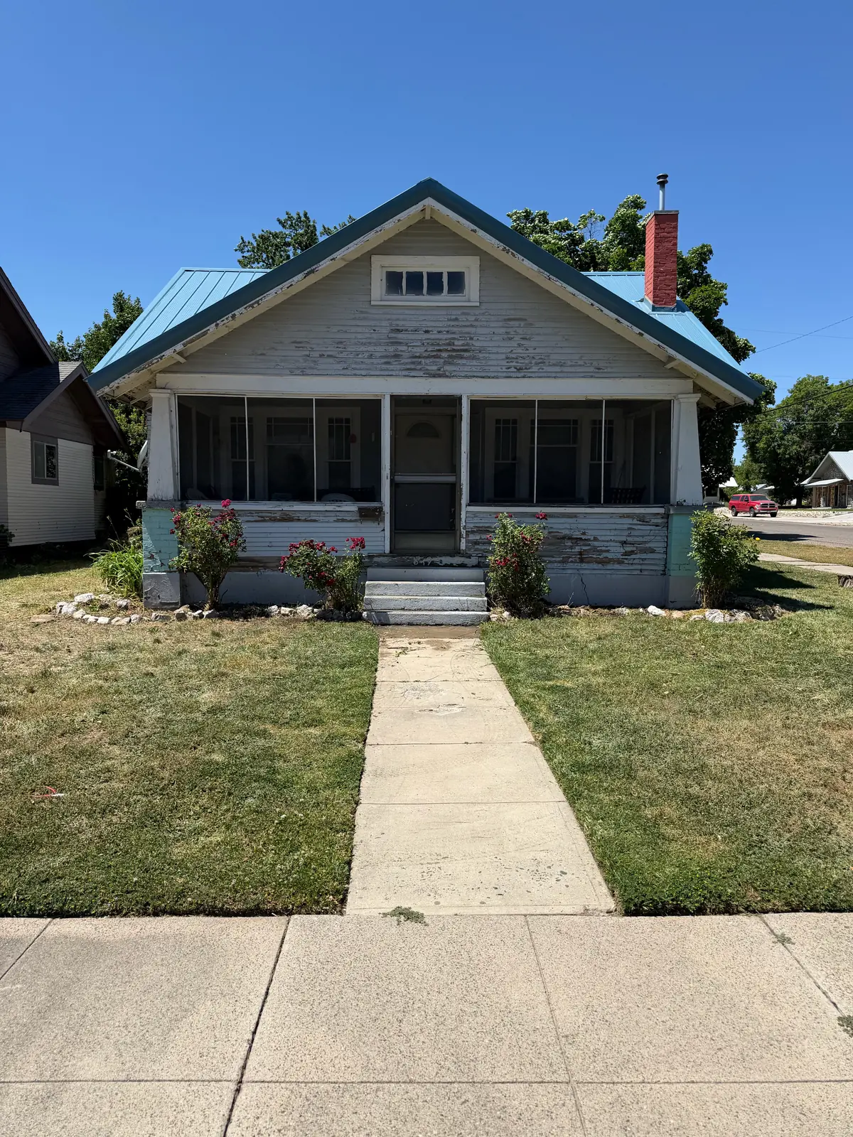 Bungalow repaint (before) in Weiser, ID by Glenn Painting Co